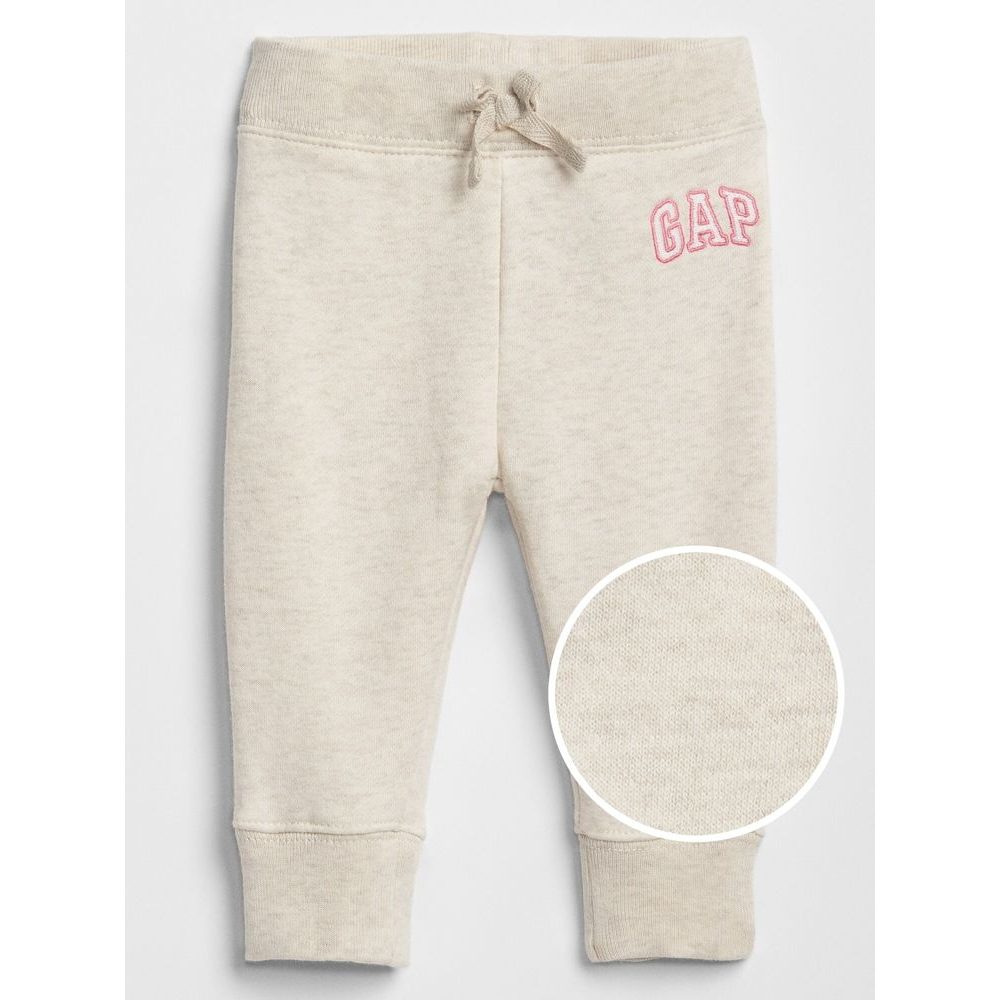 688170-04 Dětské tepláky fleece GAP logo Smetanová