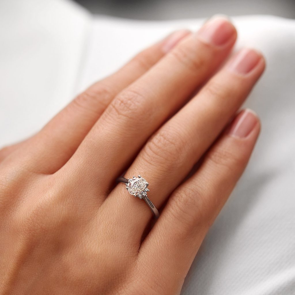 WHITE GOLD OVAL DIAMOND RING WITH SIDE DIAMONDS - DIAMOND ENGAGEMENT RINGS - ENGAGEMENT RINGS
