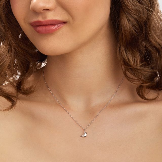 BIRD PENDANT WITH A DIAMOND IN WHITE GOLD - CHILDREN'S NECKLACES - 