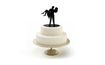Silhouette of newlyweds in arms - wedding cake figures