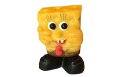 Yellow sponge figure in trousers - cake topper marzipan figure