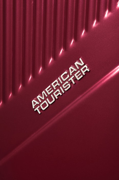 Logo značky American Tourister. AMERICAN TOURISTER, LOGO ZNAČKY AMERICAN TOURISTER. - SKOŘEPINOVÉ KUFRY - CESTOVNÍ KUFRY A TAŠKY
