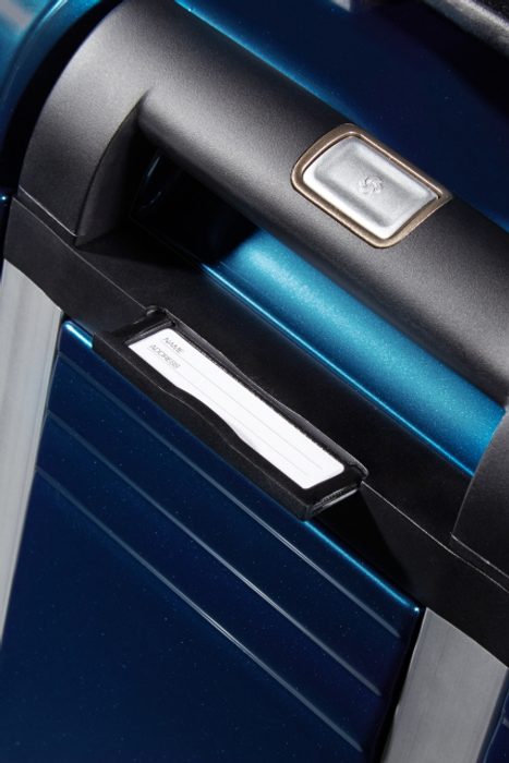 Etichetă de nume, integrată pe partea din spate a trolerului SAMSONITE, ETICHETĂ DE NUME, INTEGRATĂ PE PARTEA DIN SPATE A TROLERULUI - TROLERE RIGIDE - TROLERE ȘI GENȚI DE VOIAJ