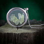 MOLDAVITE STEEL FLOATING LOCKET, ORIGINAL FROM THE CZECH REPUBLIC - MOLDAVITE