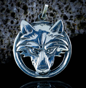 WOLF'S HEAD IN A RING, STERLING SILVER PENDANT - PENDANTS