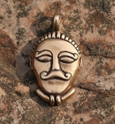 CELTIC HEAD, bronze pendant