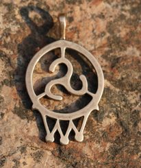 TRISKELE IN CIRCLE, bronze pendant
