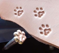 CAT Track, leather stamp
