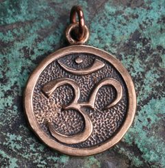 OM, bronze pendant