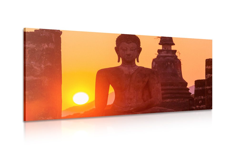 Obraz socha Budhu uprostřed kamení
