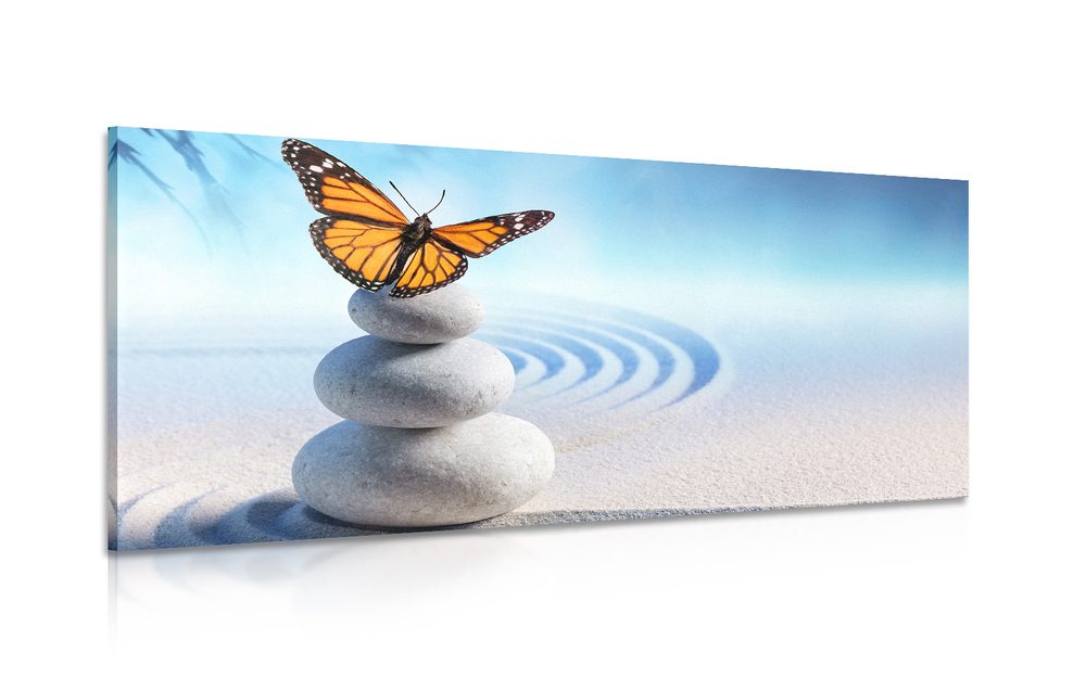 Obraz rovnováha kameňov a motýľ