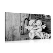 CANVAS PRINT STATUES OF ANGELS ON A BENCH IN BLACK AND WHITE - BLACK AND WHITE PICTURES - PICTURES