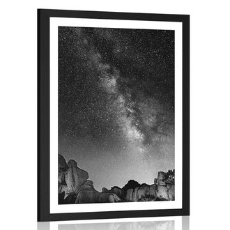 POSTER WITH MOUNT STARRY SKY ABOVE THE ROCKS IN BLACK AND WHITE - BLACK AND WHITE - POSTERS