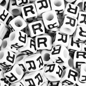 White plastic bead 7 mm with letter R