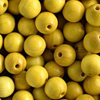 Yellow plastic beads with Emojis