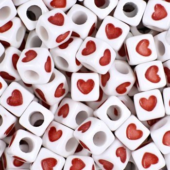 White plastic bead 7 mm with heart