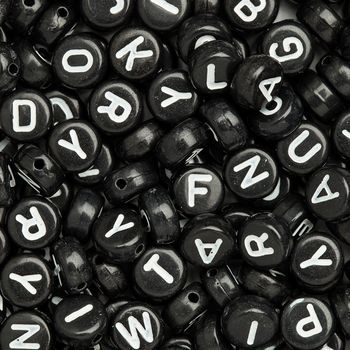 Black mix of plastic beads 7x4 mm with letters