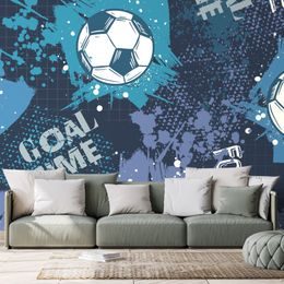 Samolepiaca tapeta futbalová lopta na modrom pozadí