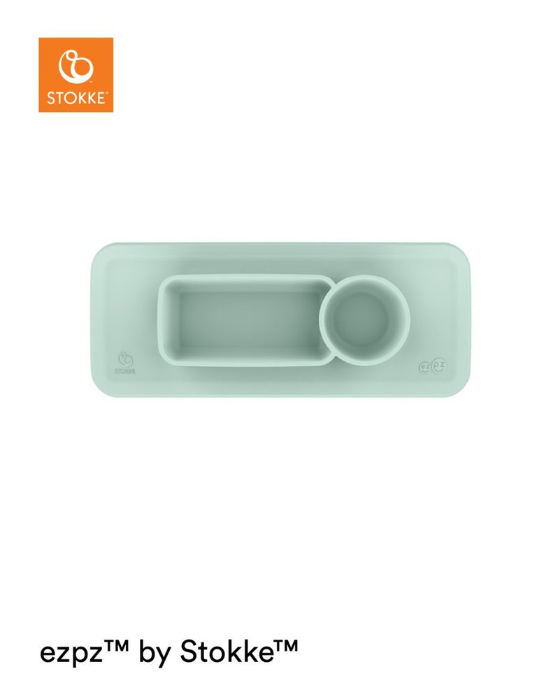 Levně STOKKE® Clikk™ Silikonová podložka na pultík - Soft Mint