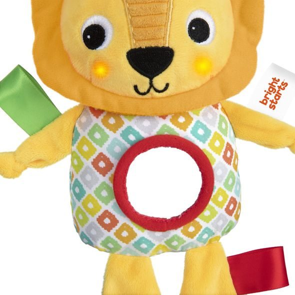 BRIGHT STARTS HRAČKA S MELODIÍ NA C KROUŽKU LEV HUGGIN' LIGHTS ™0M+ - HRAČKY SE ZVUKY - PRO DĚTI