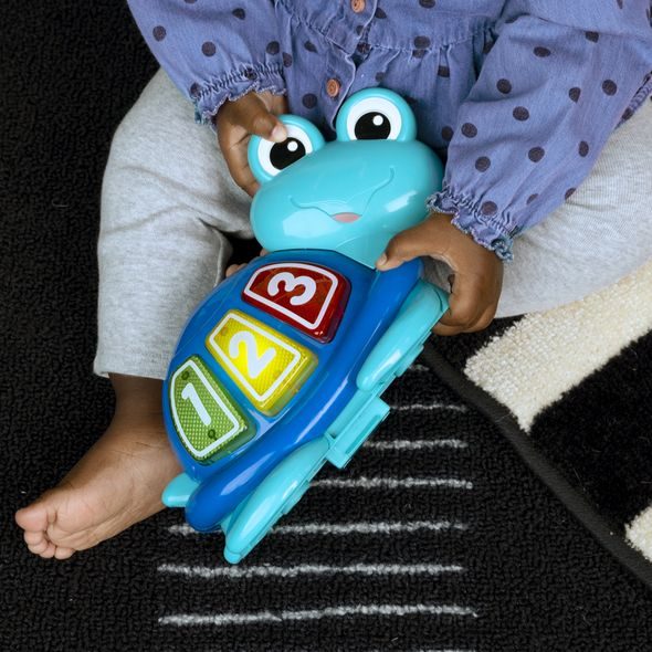 BABY EINSTEIN SKÁKADLO/AKTIVNÍ CENTRUM 2V1 CURIOSITY COVE™ 6M+ DO 11KG - VOZÍTKA A ODRÁŽEDLA - PRO DĚTI