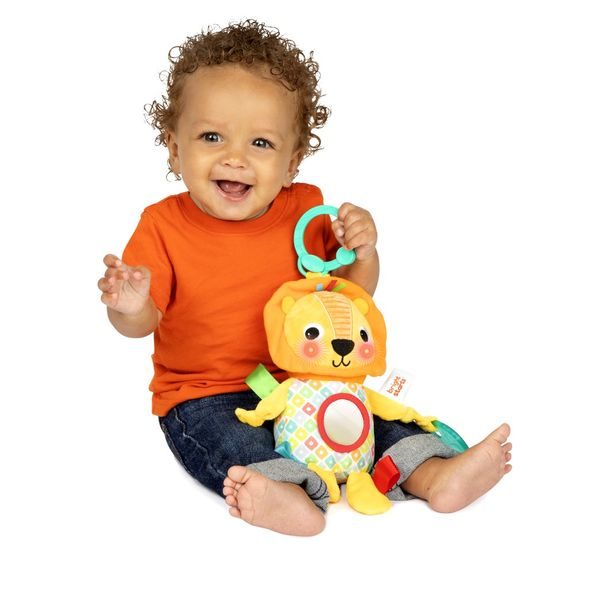 BRIGHT STARTS HRAČKA S MELODIÍ NA C KROUŽKU LEV HUGGIN' LIGHTS ™0M+ - HRAČKY SE ZVUKY - PRO DĚTI