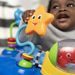 BABY EINSTEIN SKÁKADLO NEPTUNE’S OCEAN DISCOVERY™ 6M+ DO 11KG - VOZÍTKA A ODRÁŽEDLA - PRO DĚTI