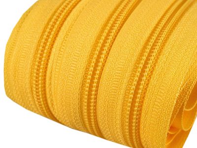 Zip spirálový 5 mm metráž pro jezdce typu POL{% if variant.name %} – 111 žlutá - tmavá{% endif %}