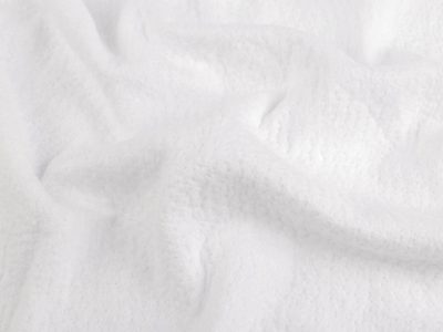 Bavlněný vatelín / rouno 135 g/m² šíře 244 cm Freudenberg metráž{% if product.brand.name %} – Stoklasa{% endif %}