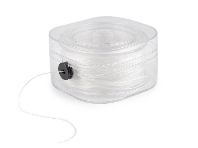 Pruženka / gumička plochá šíře 0,8 mm krabička s odvíjením