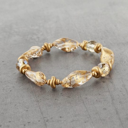 Náramek ze skleněných kamenů čirý/zlatý pokov