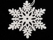 Dřevěná dekorace vločka