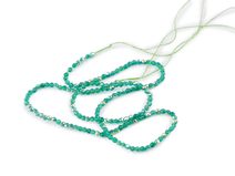 Skleněné korálky broušené ohňovky 2 mm s AB efektem, na šňůrce