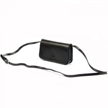 Kožená malá dámská podélná crossbody kabelka hnědá