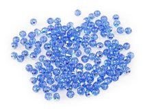 Skleněné korálky broušené ohňovky 4 mm s AB efektem