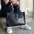 Elegantní větší černá dámská kabelka do ruky S684 GROSSO