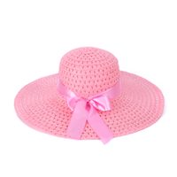Růžový klobouk s růžovou mašlí