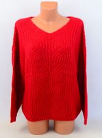 Nenošený červený svetr