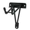Fe on the wall behind the pedal, black