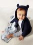 215587-10 Baby svetr Brannan bear Tmavě modrá