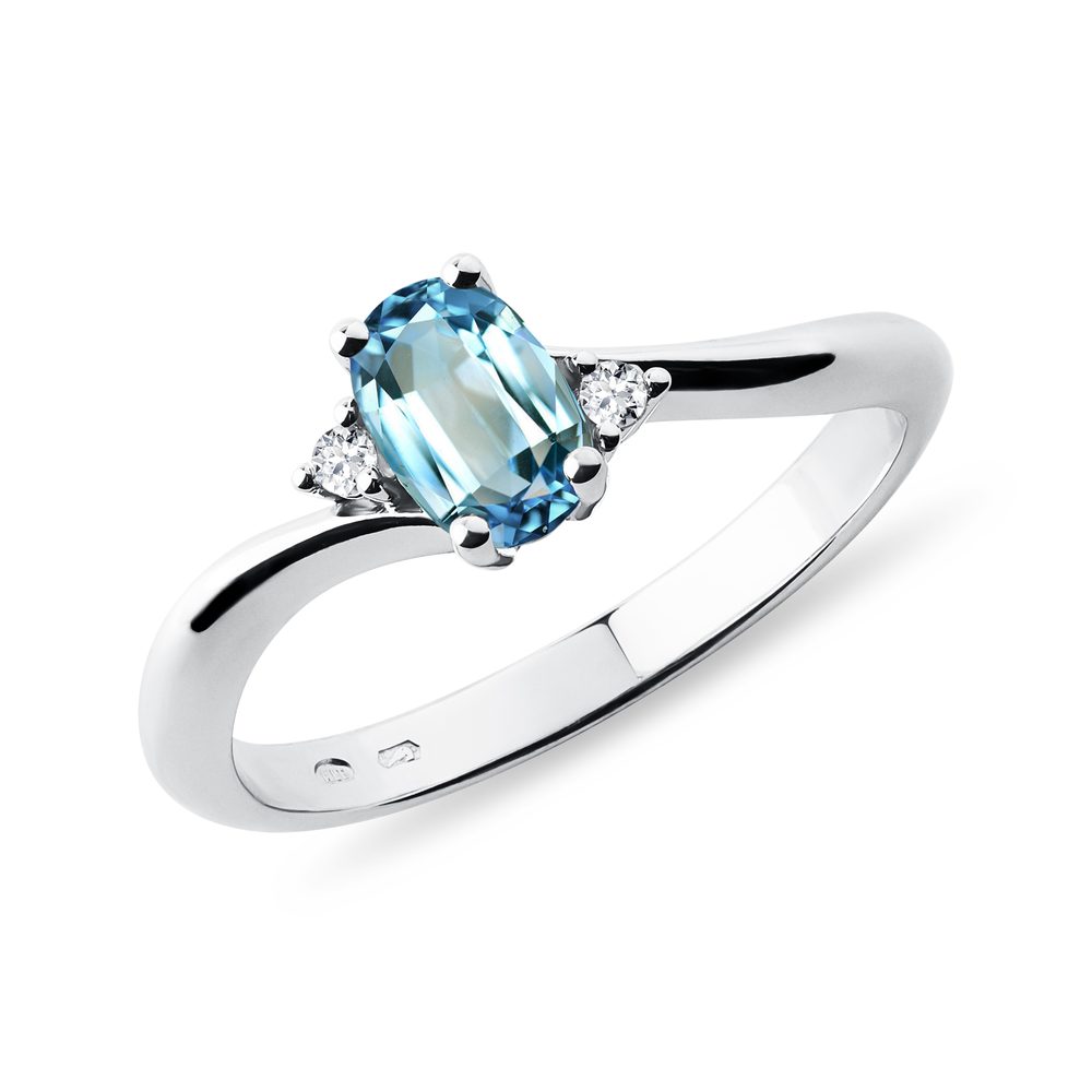 E-shop Prsten z bílého 14k zlata s topazem a diamanty