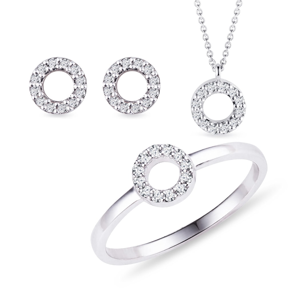 Diamond halo necklace, earring, and 