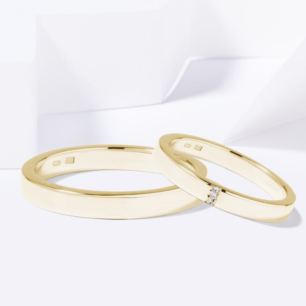 Snubní prsteny ze žlutého zlata se třemi diamanty | KLENOTA