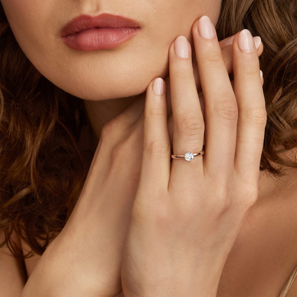 Half carat diamond on hand discount