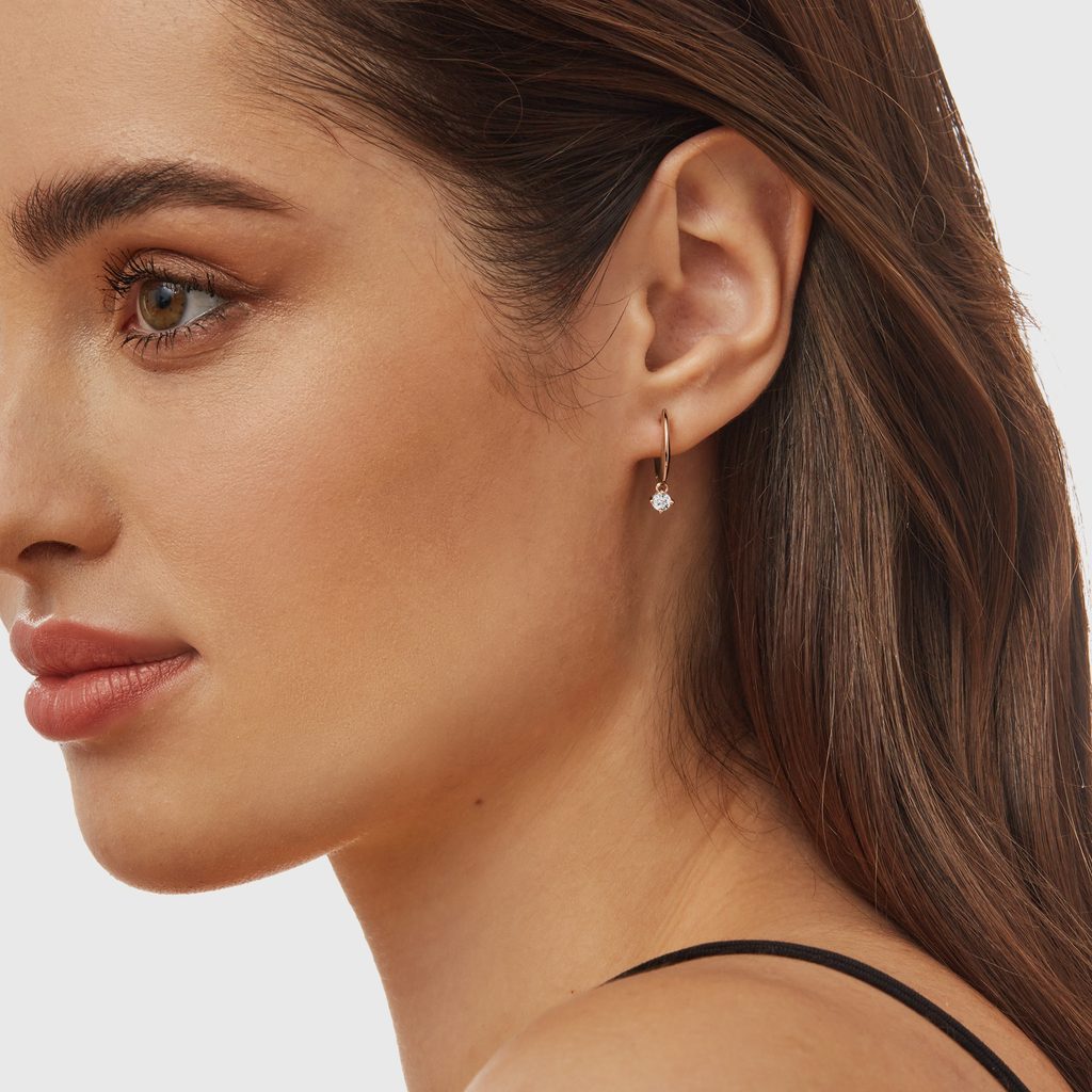 Interessante Ohrringe aus Roségold mit Diamant | KLENOTA