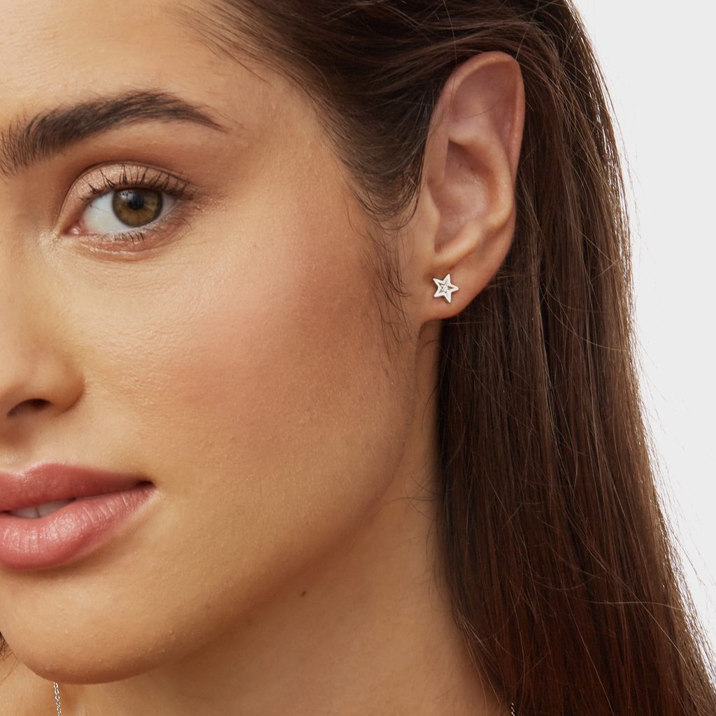 Star-shaped diamond earrings in white gold | KLENOTA