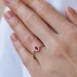 OVAL RUBY AND DIAMOND GOLD HALO RING - RUBY RINGS - 