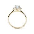 Oval cut diamond engagement ring in yellow gold