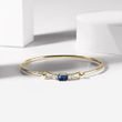 Gold bracelet with a sapphire and diamonds