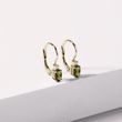 Oval moldavite and diamond earrings in gold